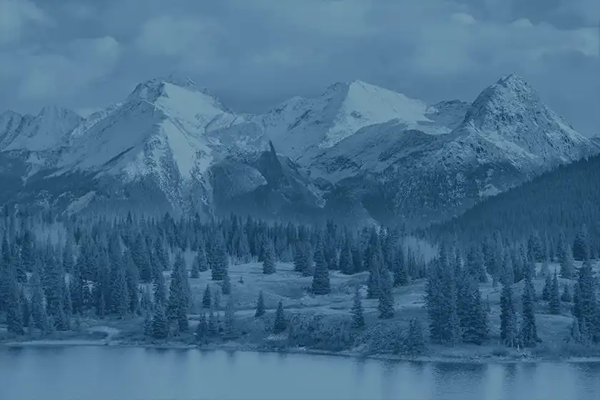 This image of the Rocky Mountains serves as a background until the document cover is rendered.